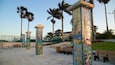 Royal Palm Pointe Park which includes outdoor art, a sunset and a garden