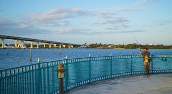 Royal Palm Pointe Park featuring fishing and a river or creek as well as an individual male
