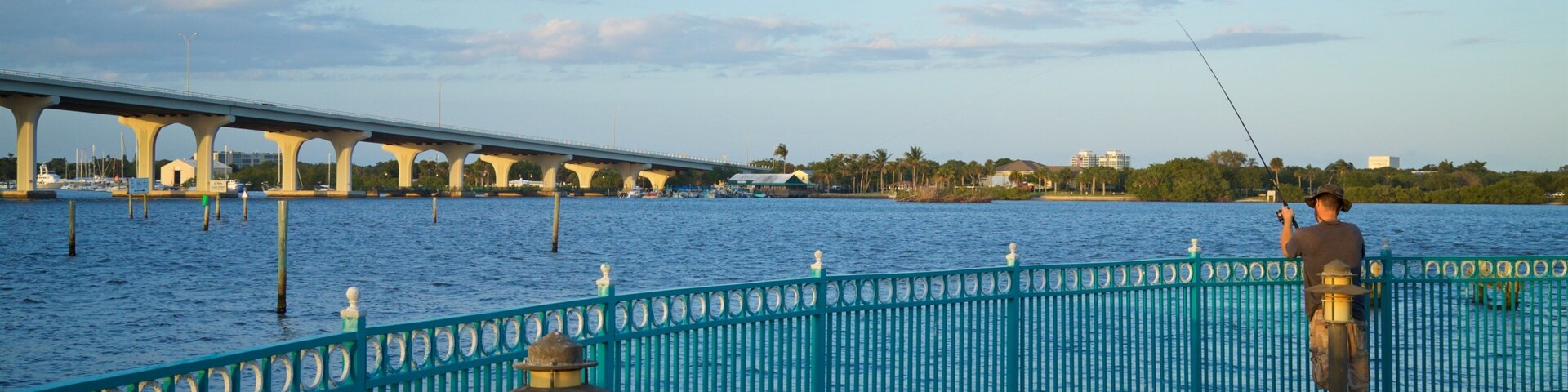 Royal Palm Pointe Park featuring fishing and a river or creek as well as an individual male