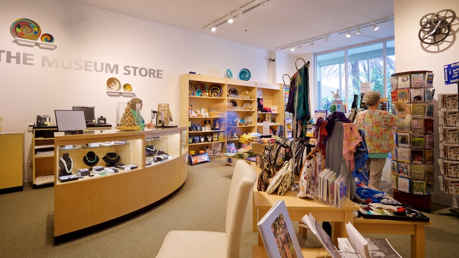 Vero Beach Museum of Art featuring signage and interior views