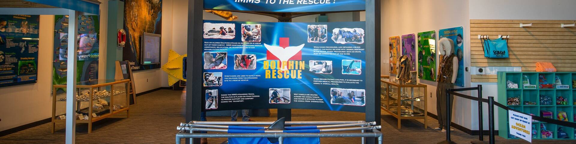 Institute for Marine Mammal Studies showing signage and interior views