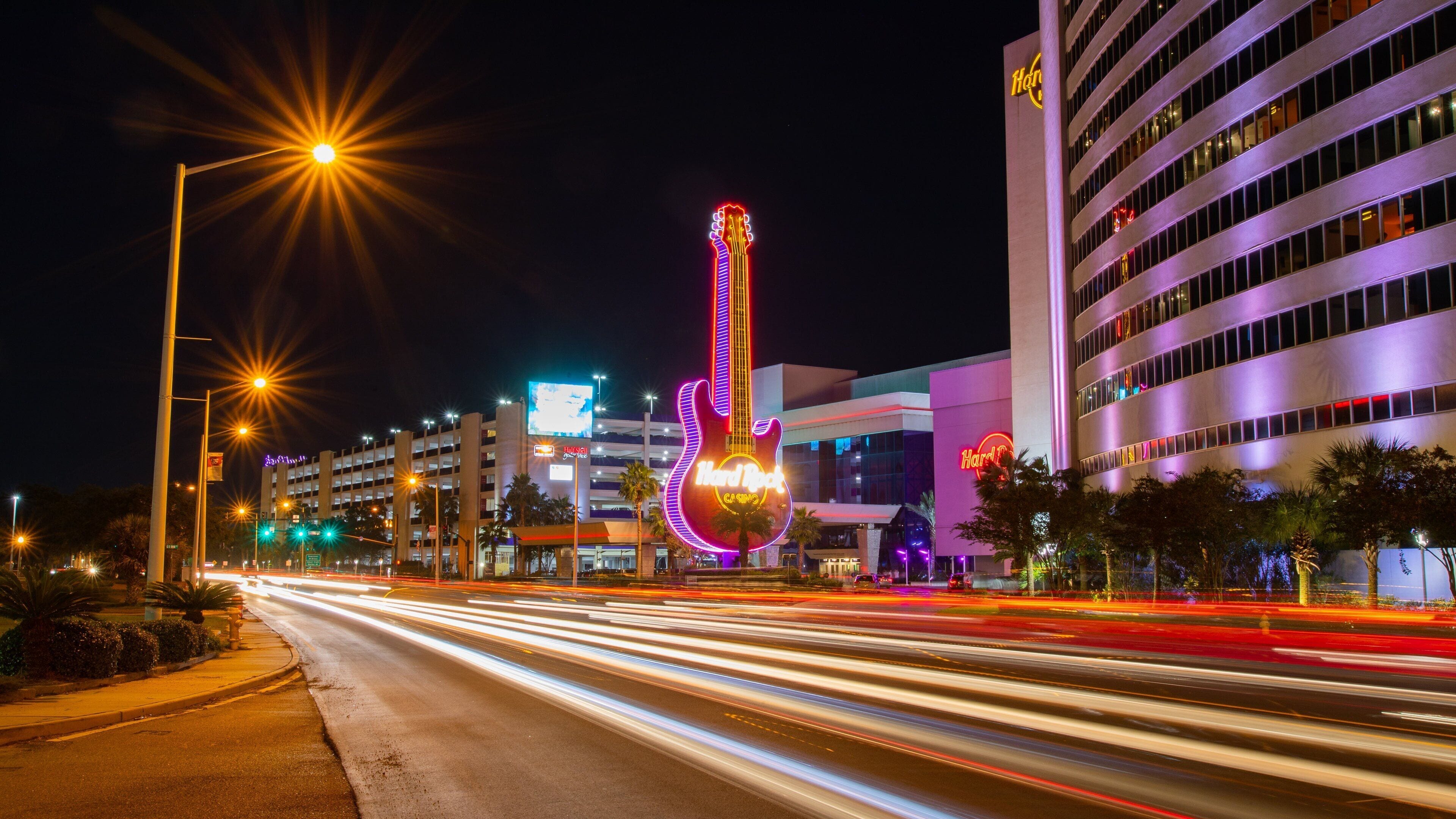 Hard Rock Casino Biloxi which includes night scenes and signage