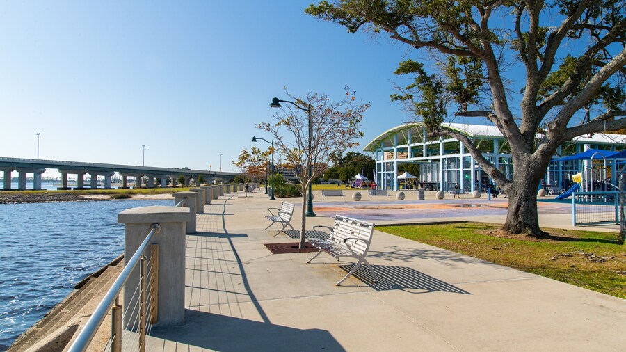 Point Cadet Plaza which includes a park and a river or creek