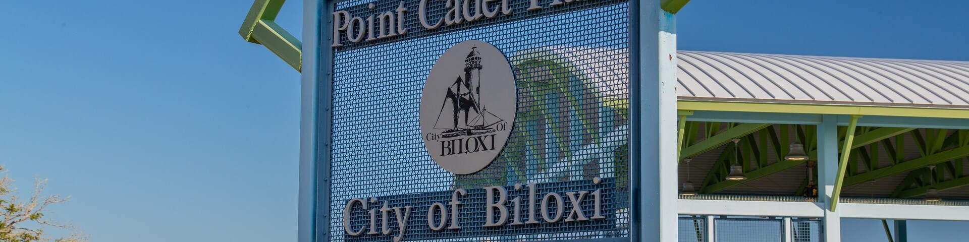 Point Cadet Plaza showing signage