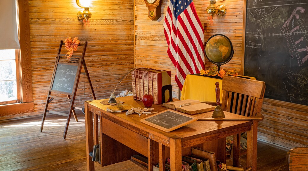 Camp Walton Schoolhouse Museum showing interior views