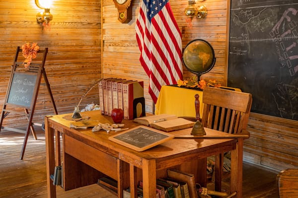 Camp Walton Schoolhouse Museum showing interior views
