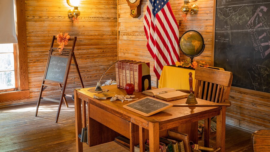 Camp Walton Schoolhouse Museum showing interior views