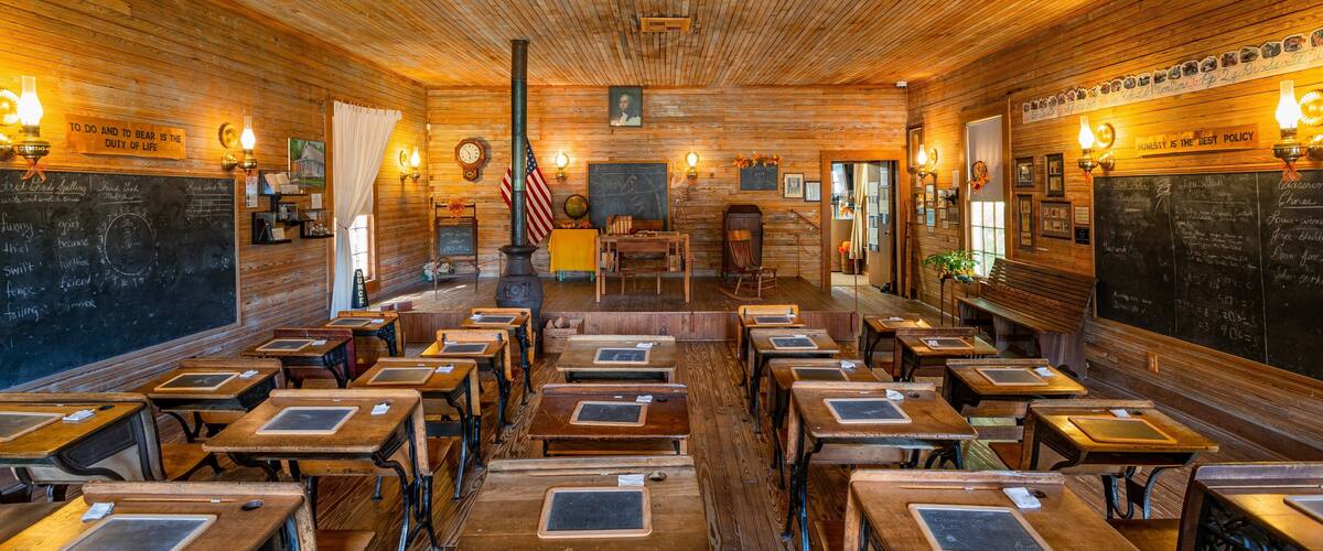Camp Walton Schoolhouse Museum which includes interior views and heritage elements