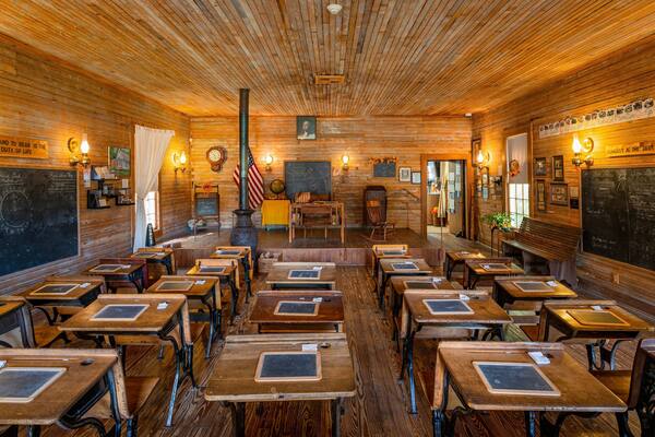 Camp Walton Schoolhouse Museum which includes interior views and heritage elements