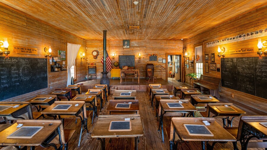 Camp Walton Schoolhouse Museum which includes interior views and heritage elements