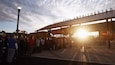 A crowd at Tuscaloosa Amphitheater during sunset.