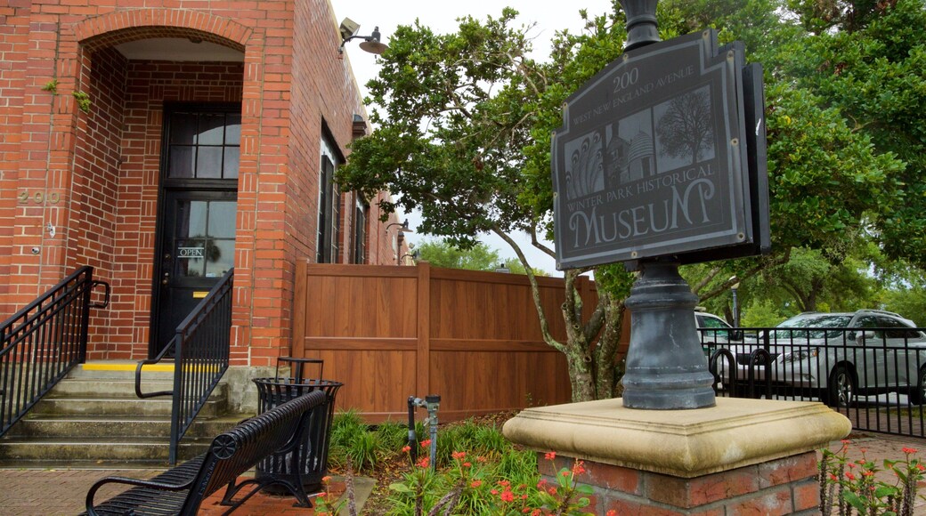 Winter Park Historical Museum featuring signage and wildflowers