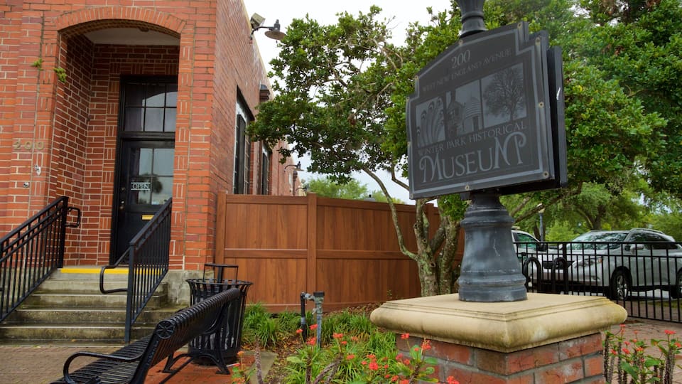 Winter Park Historical Museum featuring signage and wildflowers