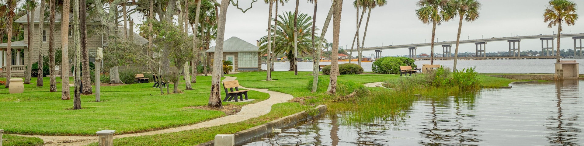 Ames Park which includes a park and a river or creek