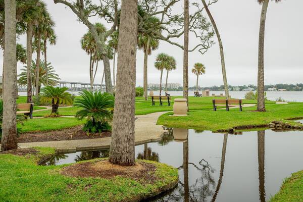 Ames Park featuring a garden and a pond