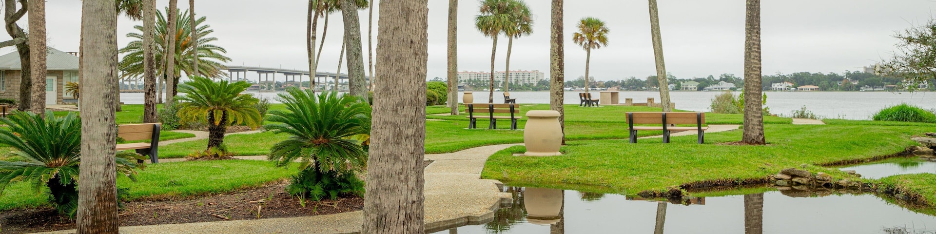 Ames Park featuring a garden and a pond