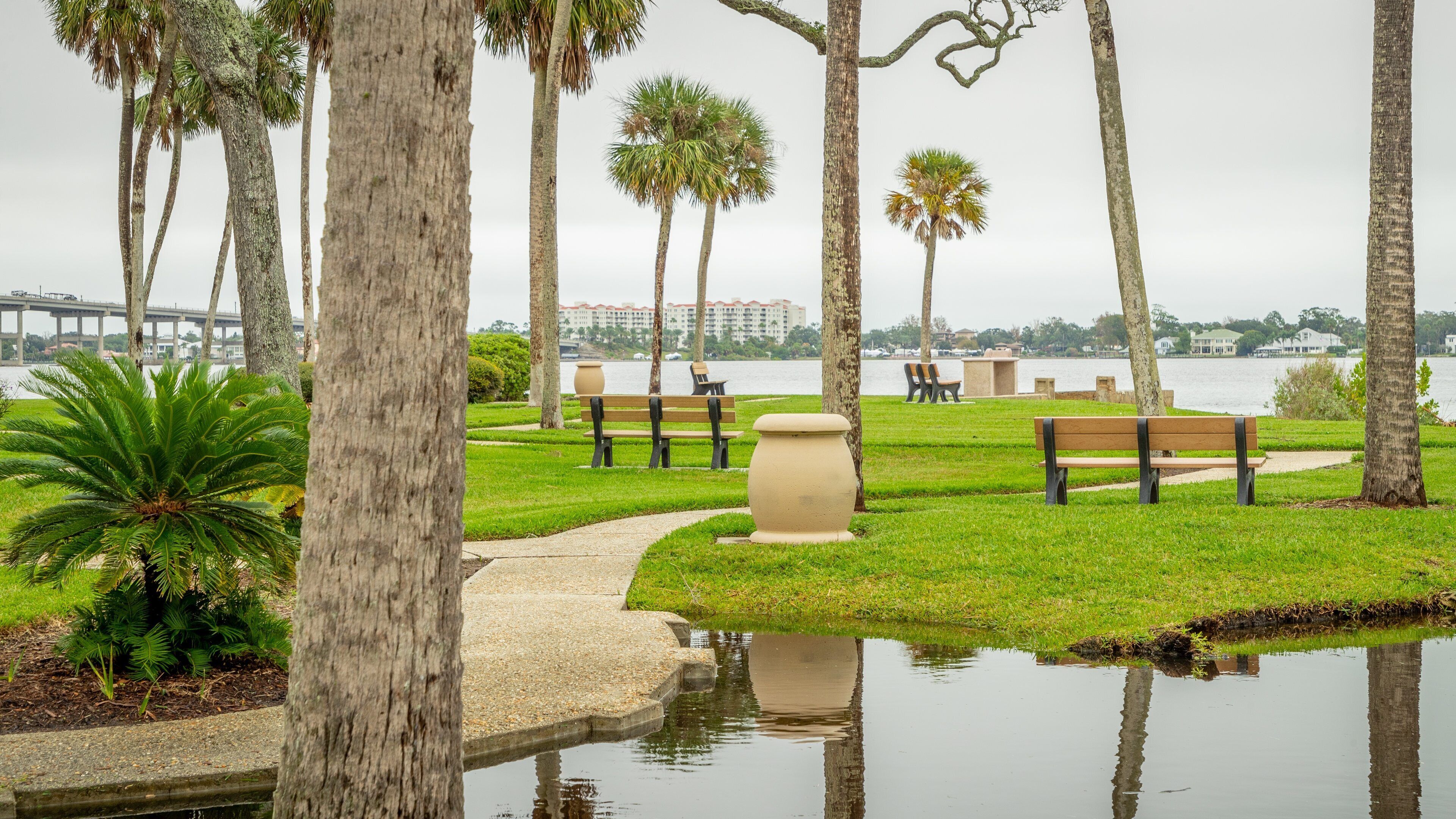 Ames Park featuring a garden and a pond