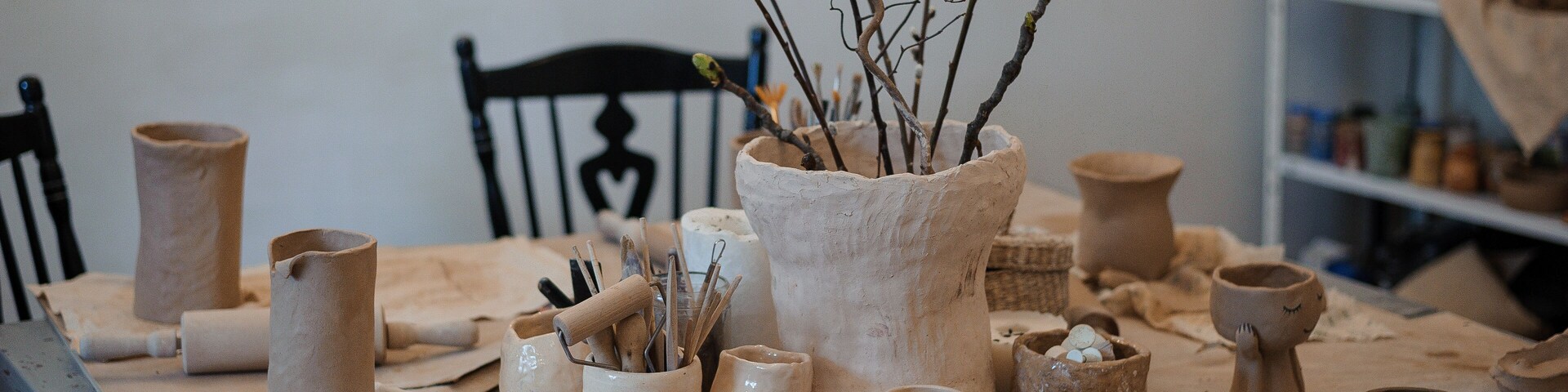Serene Pottery Studio with Clay Creations and Natural Elements
