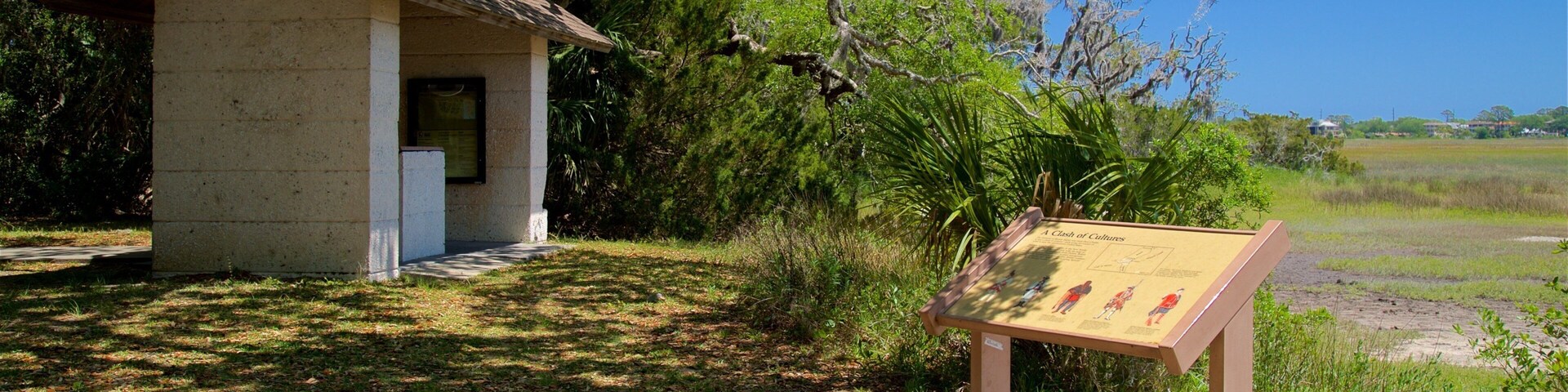 Bloody Marsh Battle Site featuring tranquil scenes, signage and a garden