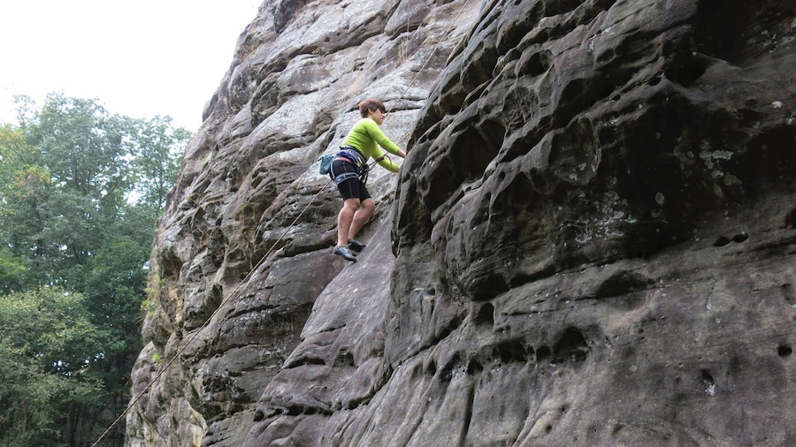 Giant City State Park featuring climbing as well as an individual femail