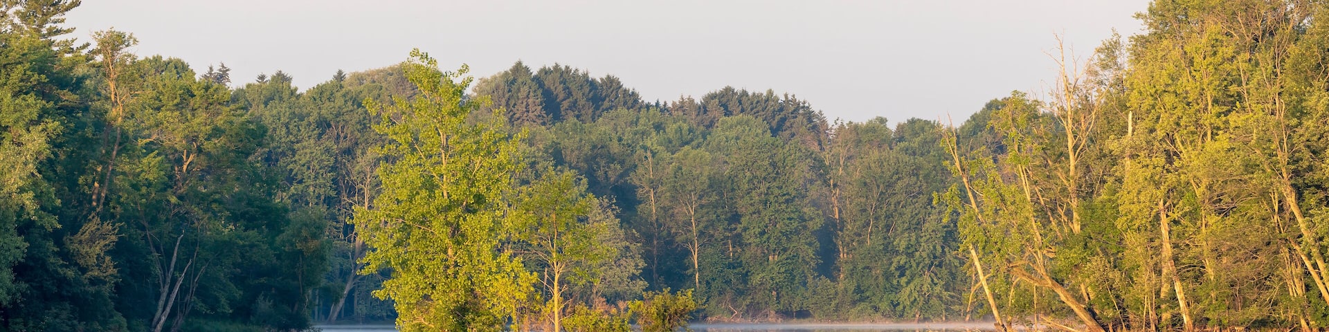 Sunny morning on a Silver lake in Wisconsin