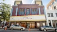 The exterior of the Georgia Theatre with a marquee reading "Zoso Aded Color".
