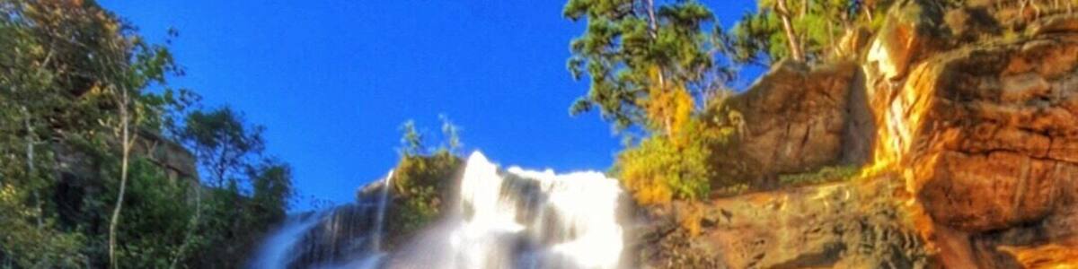 A waterfall cascading down a rocky cliff.