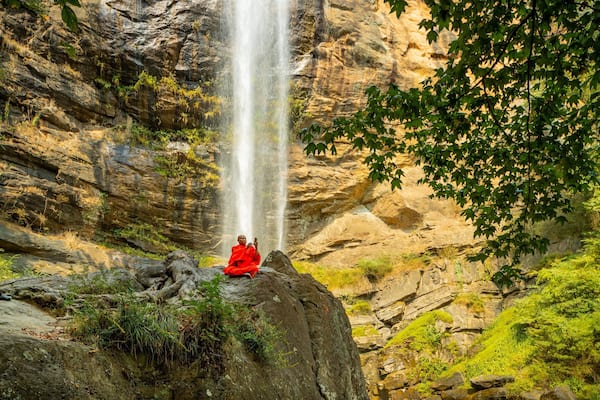 Toccoa Falls which includes religious elements and a waterfall as well as an individual male