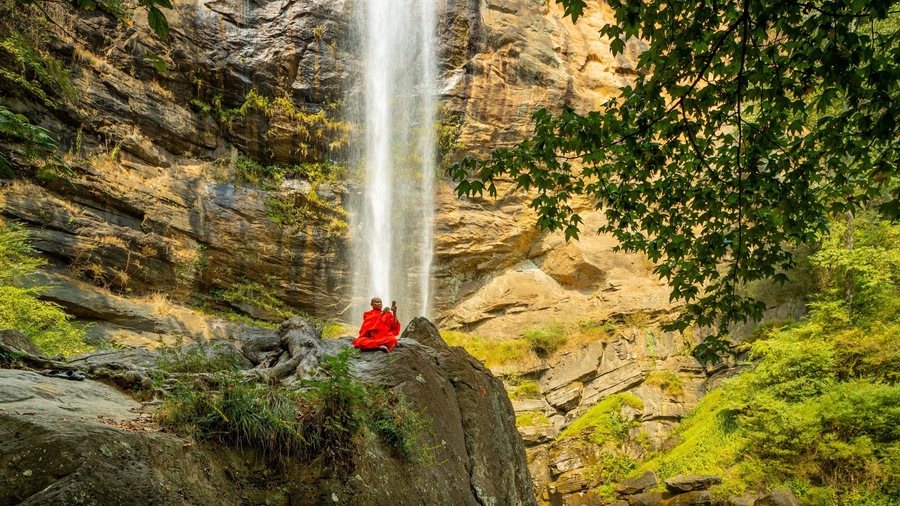 Toccoa Falls which includes religious elements and a waterfall as well as an individual male