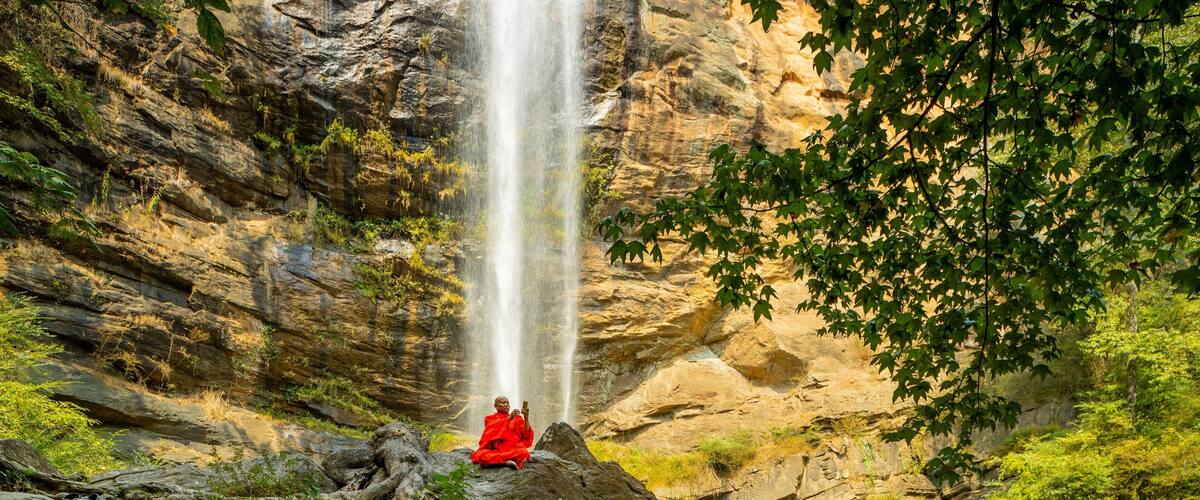 Toccoa Falls which includes religious elements and a waterfall as well as an individual male