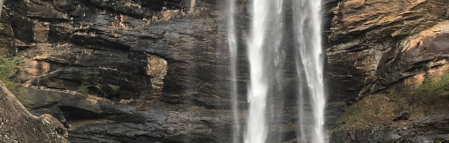 A waterfall cascading down a rocky cliff.