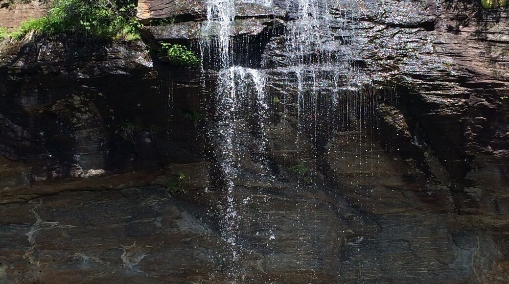 Small, yet lovely roadside waterfall - drive under it! Such a sweet discovery.
