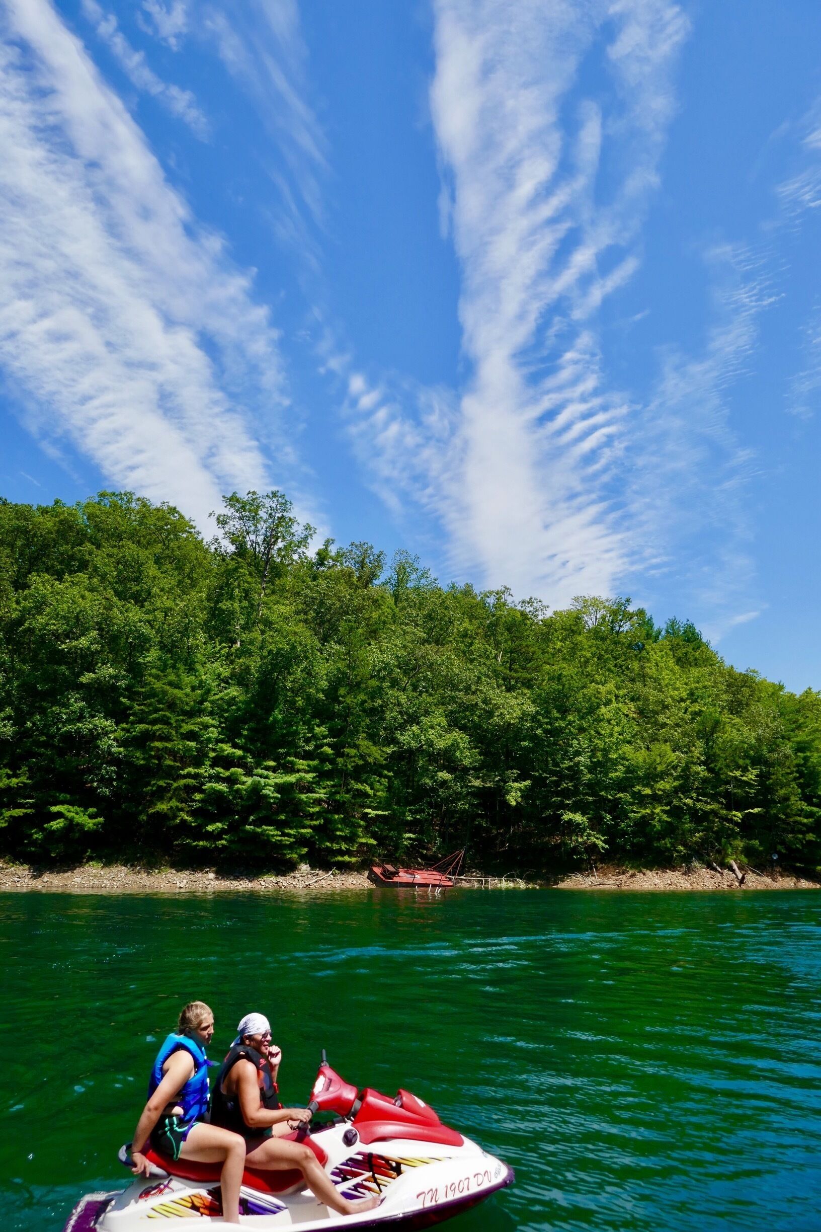 Blue skies above Fontana lake 