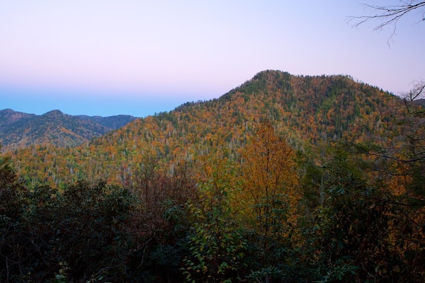 Chimney Tops which includes tranquil scenes, landscape views and a sunset