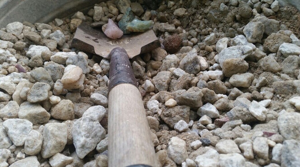 They give you a big ol' bucket of rocks and let you sift through to find your own gems! Doesn't look like much at first, but once you sift it through water the striking colors stand out amongst the gravel