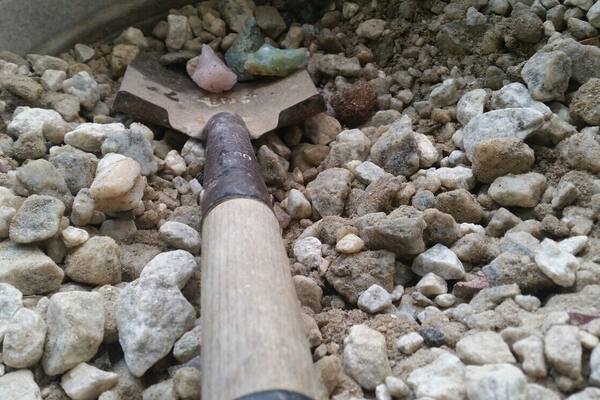 They give you a big ol' bucket of rocks and let you sift through to find your own gems! Doesn't look like much at first, but once you sift it through water the striking colors stand out amongst the gravel