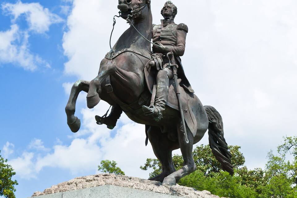 A statue of Major General Andrew Jackson on horseback, mounted on a granite pedestal with inscriptions.