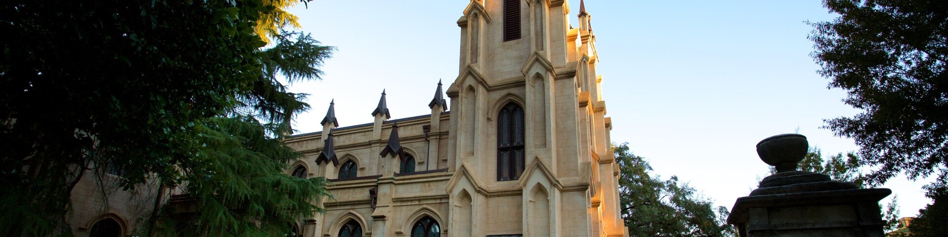 Trinity Episcopal Cathedral showing a church or cathedral, a cemetery and heritage architecture