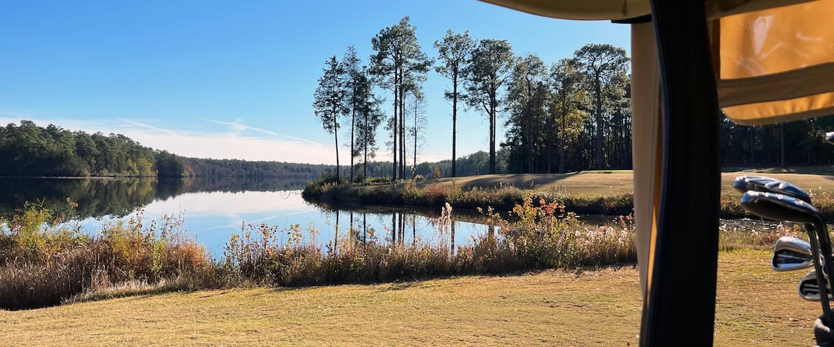 A lakeside view of the golf course at Cheraw State Park, South Carolina, USA.