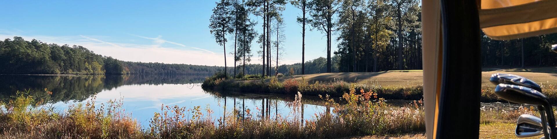 A lakeside view of the golf course at Cheraw State Park, South Carolina, USA.