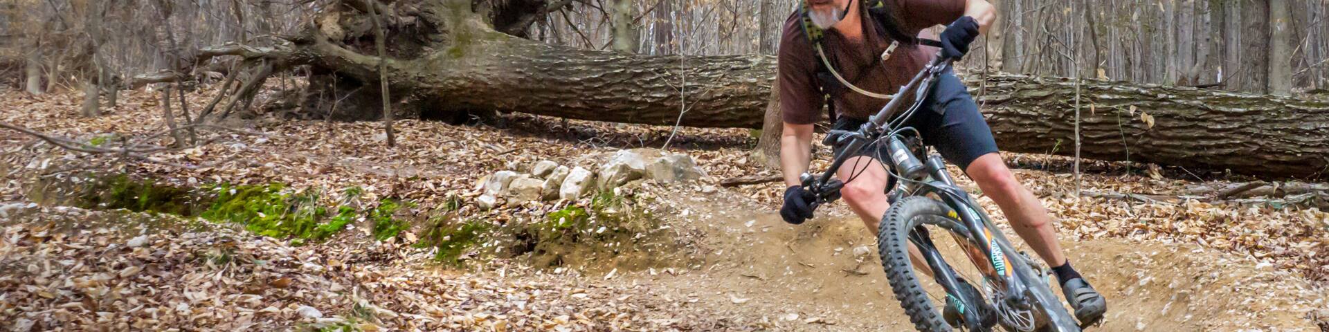 A mountain biker carves a turn on the San-Lee MTB trail near Sanford, North Carolina