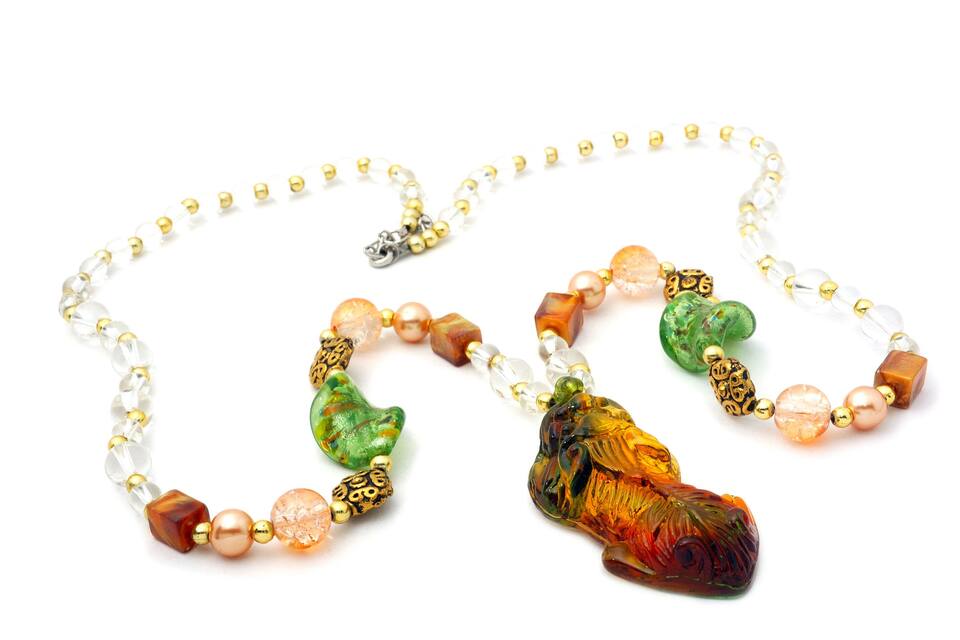 A necklace with a pendant.