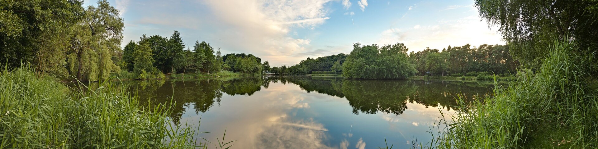 Peaceful scene from lovely small lake near Frankfurt in twillight