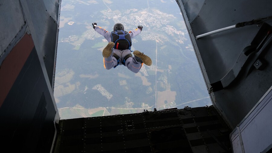 Skydiving. Start jump. A skydiver has just jumped out of a plane into the sky.