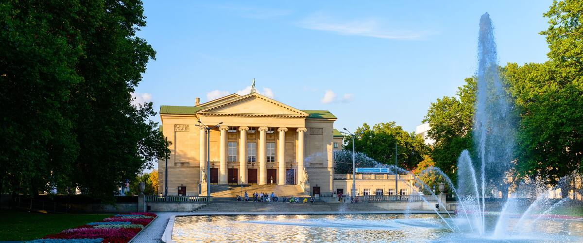 Grand Theatre - neoclassical opera house located in Poznań, Poland - in the rays of the setting sun