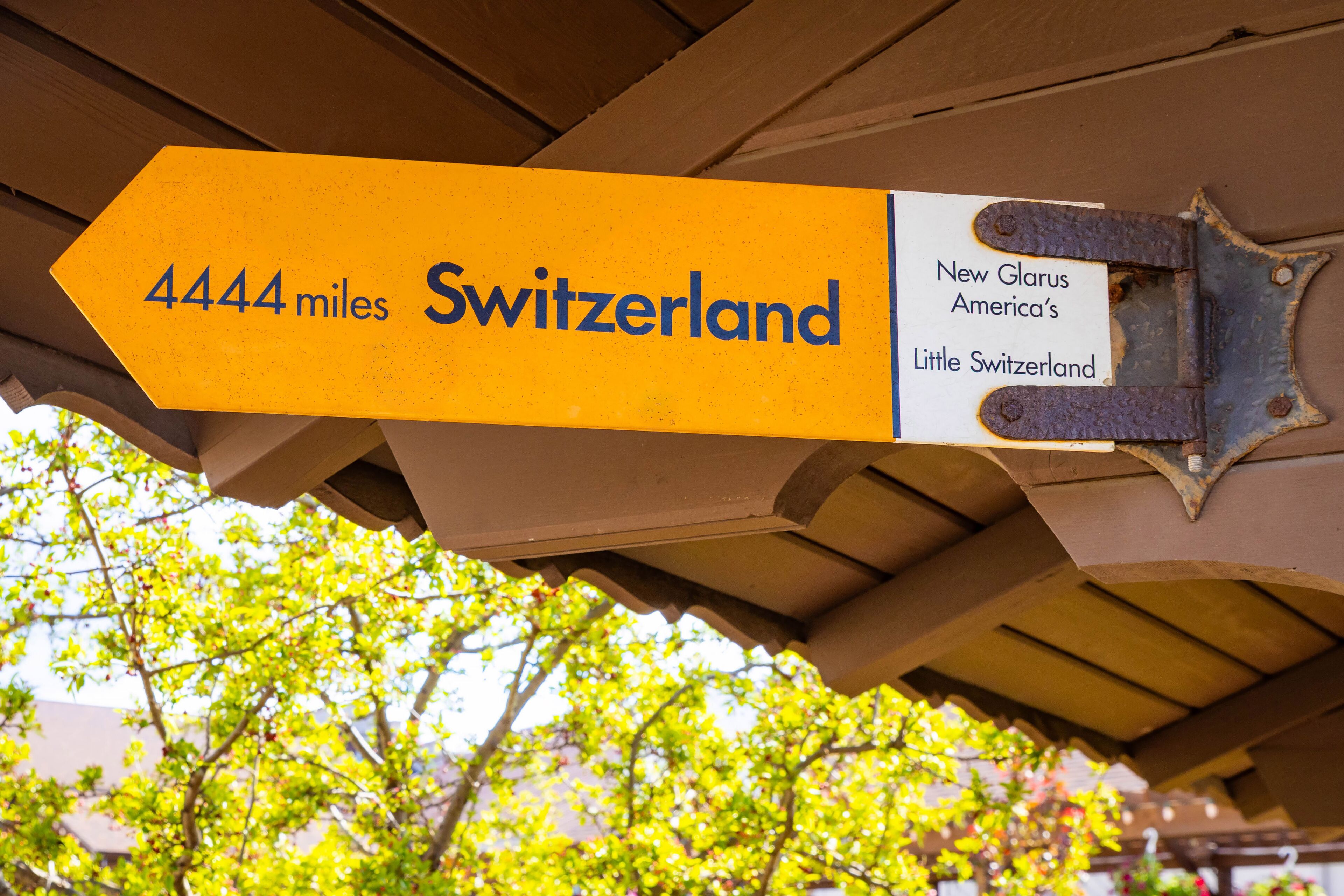 Sign Indicating Distance to Switzerland in New Glarus close up