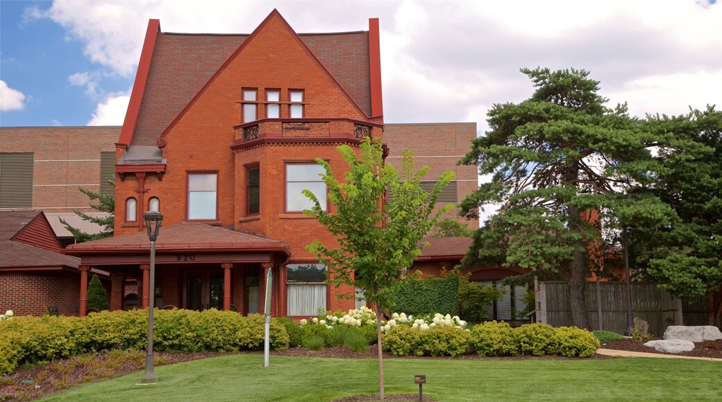 Herrmann House which includes wildflowers and a house