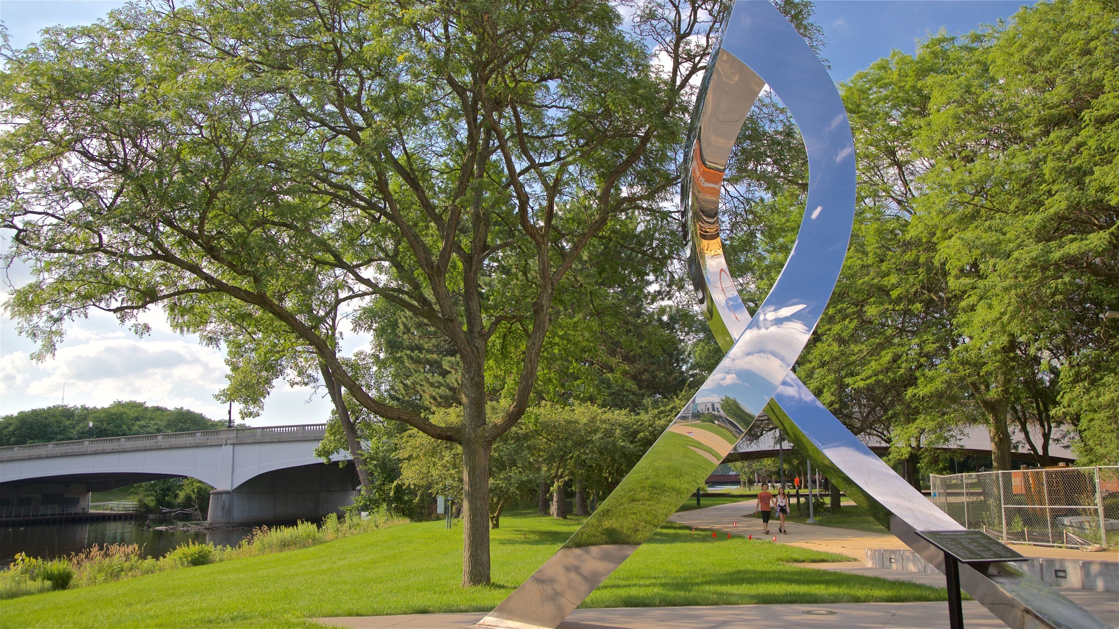 River Trail featuring outdoor art and a garden