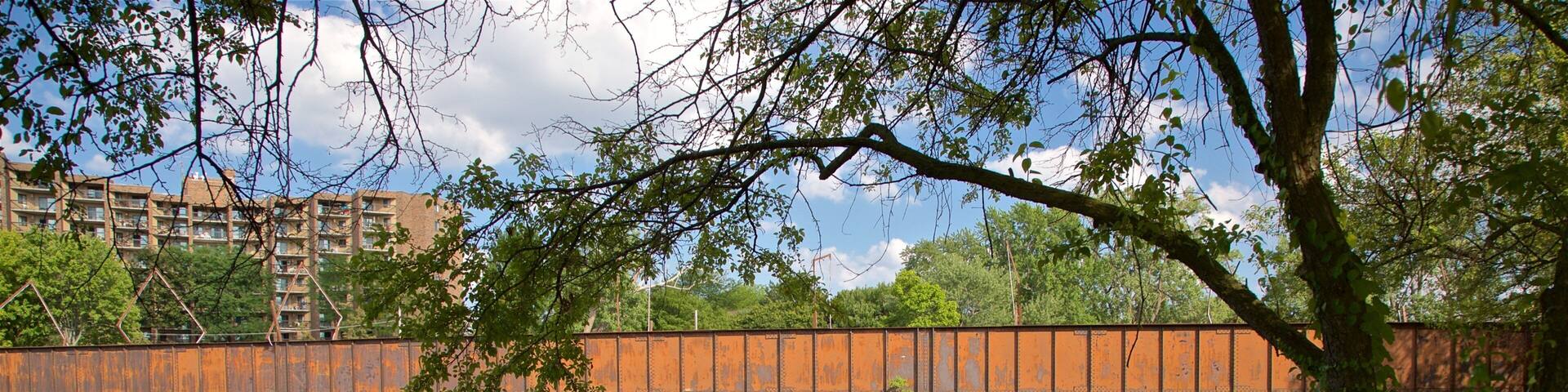 Adado Riverfront Park which includes a river or creek and a bridge