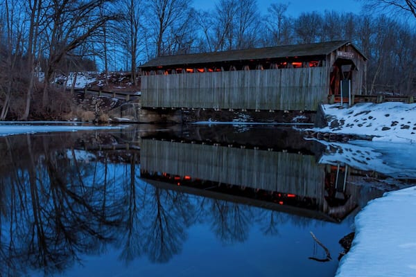 The Fallasburg bridge is part of Fallasburg park and historical villages. There is a little roadside park with a picnic table and little grill. In the summer people load and unload kayaks/canoes or tubes in the river.
